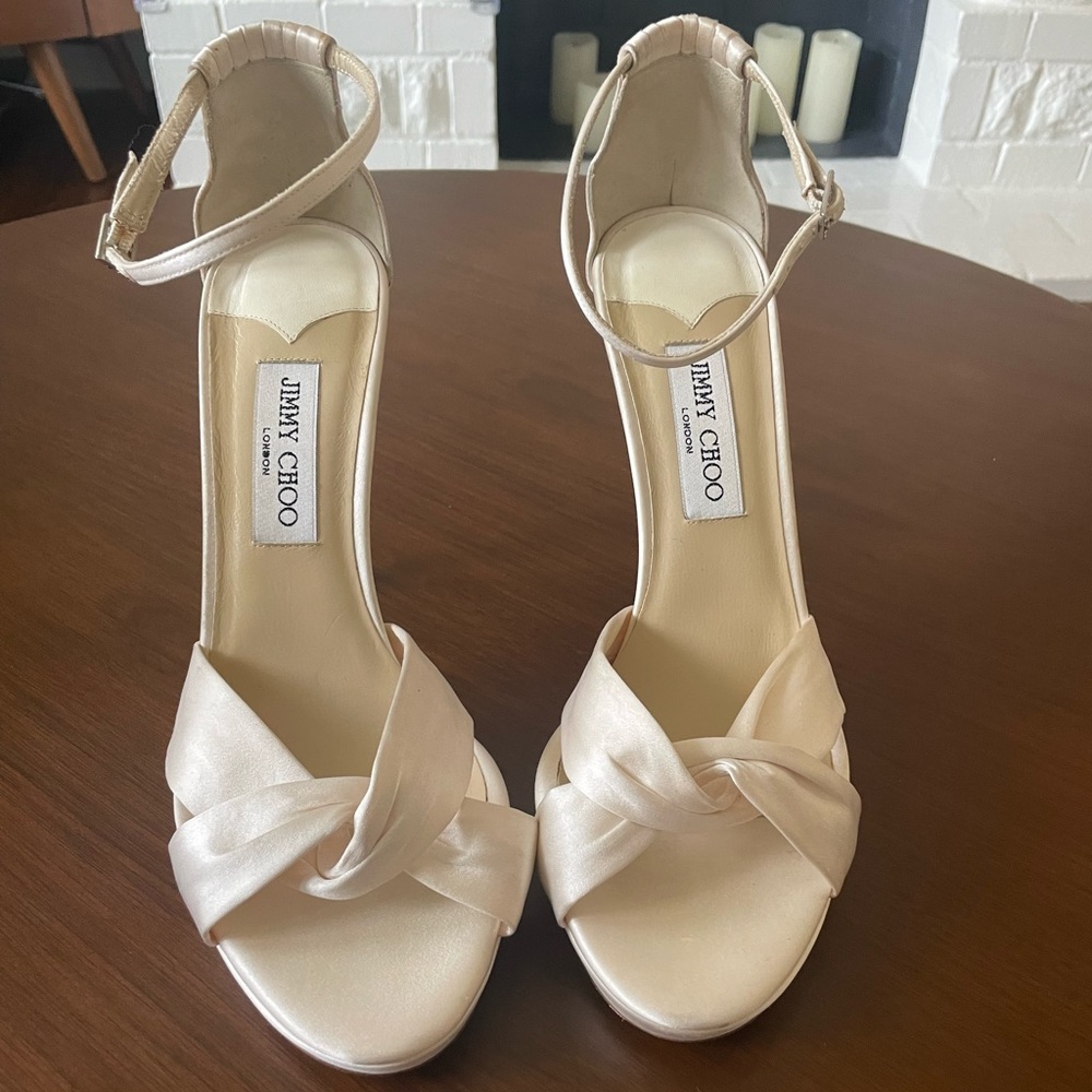 Jimmy Choo ivory heels.